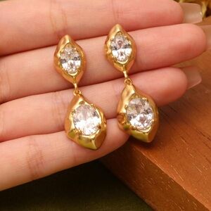 Unique Gold-tone Dangle Earrings with Simulated Cubic Zirconias